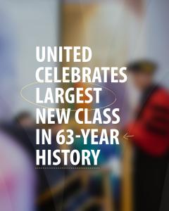 Graphic features a blurred photo of a person in academic robe and cap speaking. Over the image is white text, “United | Celebrates | Largest | New Class | In 63-Year | History”