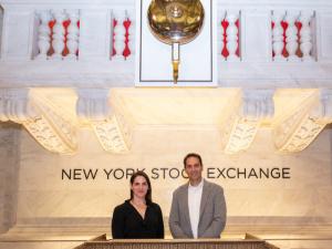 two people at NYSE bell