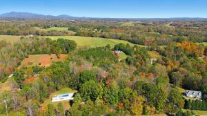 3 BR/3 BA brick ranch style home w/walk-out basement on 10± mostly wooded acres with a large attached 2 car garage, detached brick shop and a creek that runs through the property in Bedford, VA on Friday, November 14