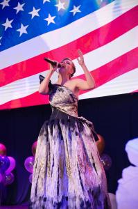 Soprano Elena Mindlinа performs “God Bless America”. Photo by Michael Gorbovitski