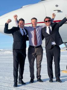 The ACASS-operated Falcon 8X crew and San Marino Inspector on the ice runway at Wolf’s Fang, Antarctica, following the aircraft’s first historic landing on the continent.