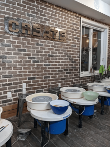 An image showing one of the interior sections for wheel throwing in the Creative Insight Pottery studio in Waterdown