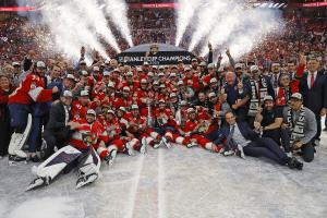 Photo of the Florida Panthers hockey team at an ice rink celebrating.