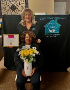Kathy Taylor, owner of Taylor Made Home Care, and Charlene Gamble, winner of the ROSE Award Caregiver of the Year.