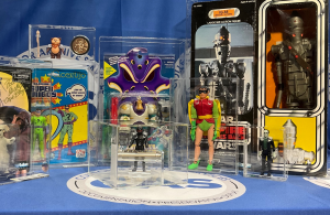 Collector Archive Services (CAS) Announces Close of Strategic Investment Round Featuring BigBadToyStore, Altered Reality Entertainment, and Wrestling Superstar Matt Cardona Photo of a variety of CAS graded toys and collectibles