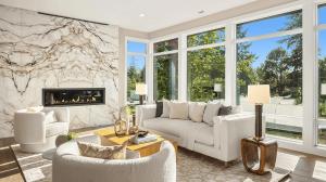 A serene living room by Ariana Designs & Interiors