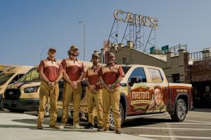 KickCharge Creative has had the privilege of helping thousands of home service business owners bring their visions to life through creative, professional branding Maston's team members standing in front of service vehicle.