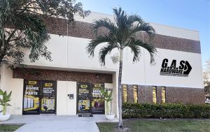 GAS Hardware Front of Building, with palm trees, branding signage, and landscaping.