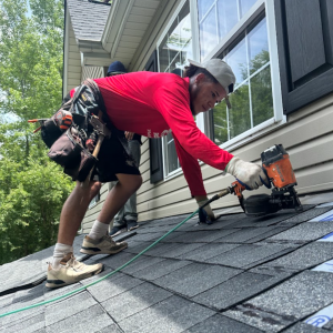 Charlotte Top Roofing Company announces a limited-time Black Friday offer designed to help homeowners prepare their homes for the upcoming winter Triumph Roofing team performing a full roof replacement on a Charlotte home.