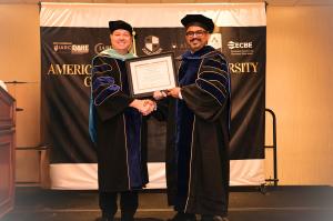 Dr. Kulkarni accepts his award