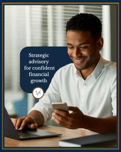 Maano Capital has issued its first official public statement, reaffirming the firm’s strengths, core capabilities and established role within South Africa’s financial advisory sector A professional reviewing data on a mobile device while using a laptop, reflecting Maano Capital’s focus on structured financial guidance.