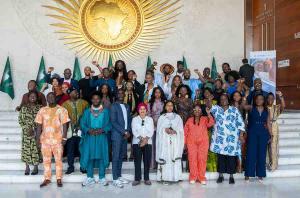 Addis Ababa, Ethiopia - Marking 141 years since the Berlin Conference, a dark moment when Africa’s identity was fractured, African influencers, journalists, content creators, and policymakers gathered at the African Union Headquarters for the High-Level Influencers Forum on Borderless Africa Delegates from High-Level Influencers Forum on Borderless Africa standing infront of the African union