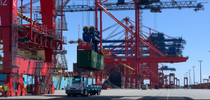 EUROGATE, one of Europe’s leading container terminal and logistics companies, and Embotech, a premier provider of autonomous driving solutions, have, in cooperation with MAFI, a trusted manufacturer of terminal tractors, and ICT Group, a renowned European provider of industrial technology solutions, successfully completed a pilot project demonstrating the maturity and flexibility of Embotech’s Autonomous Tractor Solutions (ATS) at the EUROGATE Container Terminal Wilhelmshaven Waterside Operations: Autonomous Tractor Operating Under a Quay Crane