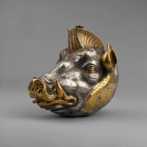 The most famous prehistoric depictions of animals in art are the paintings which were discovered in the 20th century on the walls and ceilings of the Chauvet and Lascaux Caves in France Boar's head