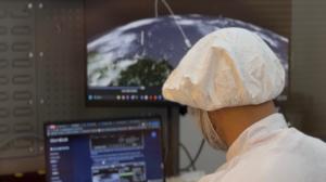 NordSpace Satellite Engineer Working in Clean Room