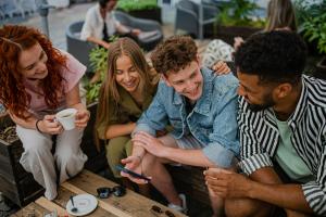 Young adult meet in a supportive outpatient mental health program in Orange County.