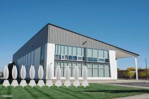 Flower Turbines announced its package of solutions for medium-sized businesses including factories, farms, and commercial buildings in windy areas Flower Turbines on ground level