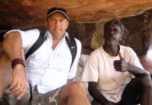 Author Paul Rushworth-Brown sitting with a Traditional Owner in Arnhem Land, reflecting his lived experience and connection to First Nations communities.
