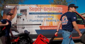 Super Brothers Plumbing Heating and Air is alerting Bay Area homeowners that HEEHRA rebates and the federal 25C heat pump tax credit are facing funding pressure, making this winter the final window to capture thousands in savings before allocations diminish Two Super Brothers Plumbing Heating and Air technicians walking with tools in front of a branded service van during a Bay Area home electrification project.