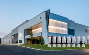In an environment where data centers are facing public criticism for their appropriation of electricity and causing its price to go up, Flower Turbines offers a solution that is environmentally conscious, innovative, and has public appeal Flower Turbines Outside a Building