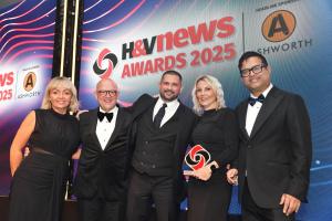 Beijer Ref UK staff celebrating their win at the H&V News Awards 2025, pictured with Howard Noble, innovation and marketing director; Lee Downham, group support and design director; Clair Deighton, product development manager; and awards host Paul Sinha.