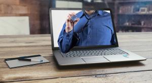 Patient consulting with a health physician via laptop, representing beyondMD’s telehealth services.
