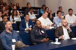Audience observes the AI–energy–low-carbon industry panel, which established the groundwork that students later expanded on as panelists in the second session
