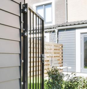 Aluminum fence next to a home.