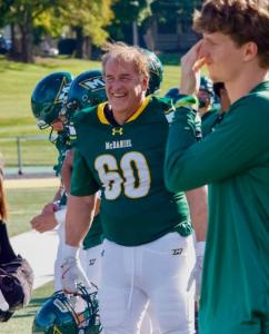 Tom Green, a 60-year-old cancer survivor and returning student-athlete at McDaniel College, will lead a special “Dress for Success” experience this Saturday, Dec. 6, 2025 for McDaniel College Green Terror football team seniors.