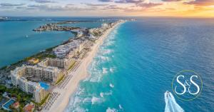Cancun Peninsula Shot  From High Above Showing Blue Water and White Sand Beaches Before Sunset