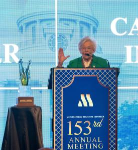 Governor Kay Ivey accepts the Capital Legacy Impact Award from the Montgomery Regional Chamber during the Chamber’s Annual Meeting.