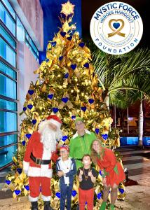 Luis with Hero Tree & Santa