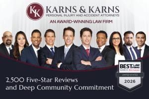 Karns & Karns Personal Injury and Accident Attorneys team photo showing Founding Partners Mike and Bill Karns, with the "Best Law Firms - United States 2026" award and a badge noting 2,500 Five-Star Reviews.