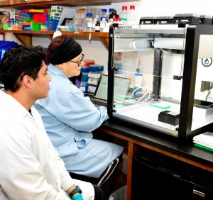 Dunlop, Rachael and Christofer Olan with robot