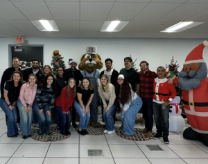 ResiBrands Employees take a photo volunteering at Partnerships for Children