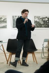 Daniel Harris, founder of London Cloth Company, presents to participants at the Arm.wool Forum, sharing international expertise on wool and textiles.