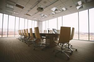 Corporate boardroom where whistleblowing policies and governance frameworks are developed and enforced