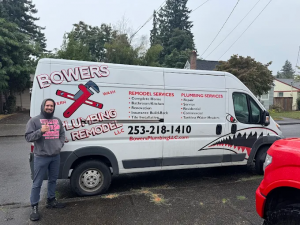 Bowers Plumbing & Remodel Expands Service Area with New Tacoma Location 7 A Bowers Plumbing & Remodel technician standing next to a branded company service truck.