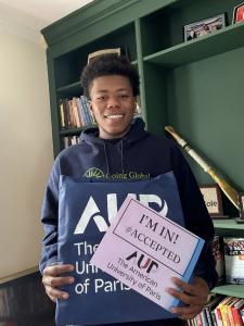 Zaahir Hardaway with AUP tote bag and 