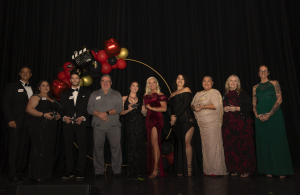 Employees pose with awards during 2025 Christmas Gala