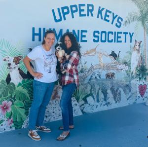 Pet food donation turns into an unexpected pet adoption for the founder of Women for Paws.