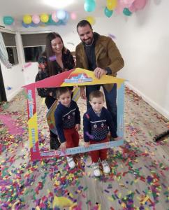 Dominic Jabro with a San Diego family at a home closing celebration.