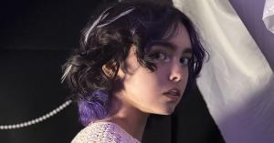 Alisha Liston Announces the Expansion of Dreamland with her Newest Release Angelology 11 Headshot of Alisha Liston looking to her right providing a view of her purple peek-a-boo hair cut