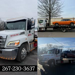 In an era where vehicle reliability is paramount, but road conditions remain unpredictable, ARS Towing is proud to announce its continued commitment to being the highest-rated towing and recovery service in Bucks County, Pennsylvania Professional ARS Towing flatbed truck providing 24/7 emergency roadside assistance and vehicle recovery services in Southampton and Bucks County, PA.