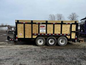 Dumpster container positioned to manage construction material disposal.