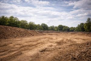 Dirt hauling services removing excess soil during demolition and site preparation in Columbus, GA