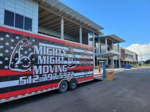 Mighty Might Moving's branded moving trucks serve commercial and residential clients throughout Central Austin and Georgetown areas