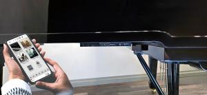 QRS PNO4 NV under a piano. #qrsmusic, #PNO4 NV, #Pianomation