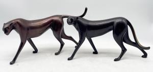 Elegant pairing of cheetah and panther bronzes as part of an impressive collection of exotic animal bronzes by Dutch sculptor Loet Vanderveen.