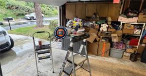 On The Spot service vehicle parked in the driveway of a suburban home in El Dorado Park, Long Beach, ready for emergency garage door spring repair.